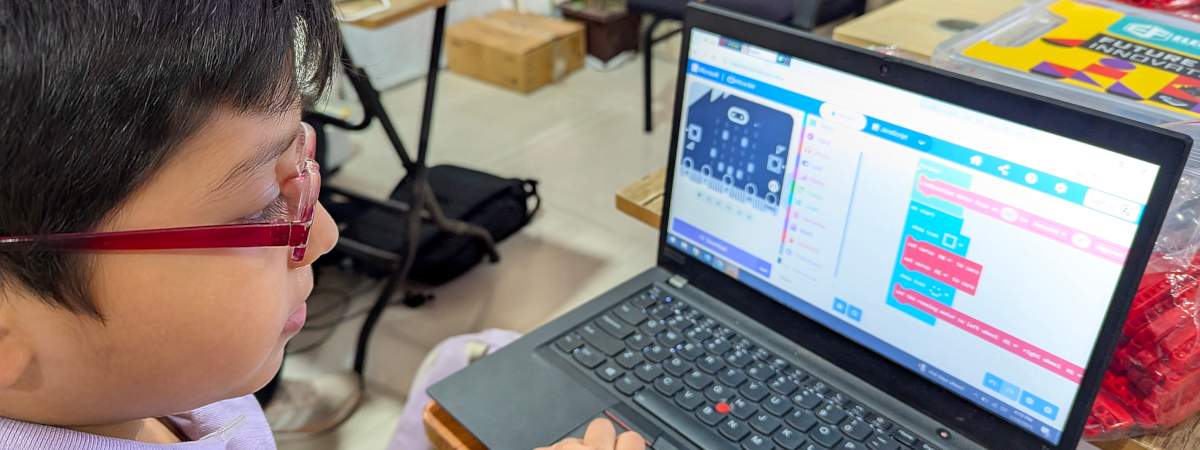 Bangladesh FI project boy w screen.jpg